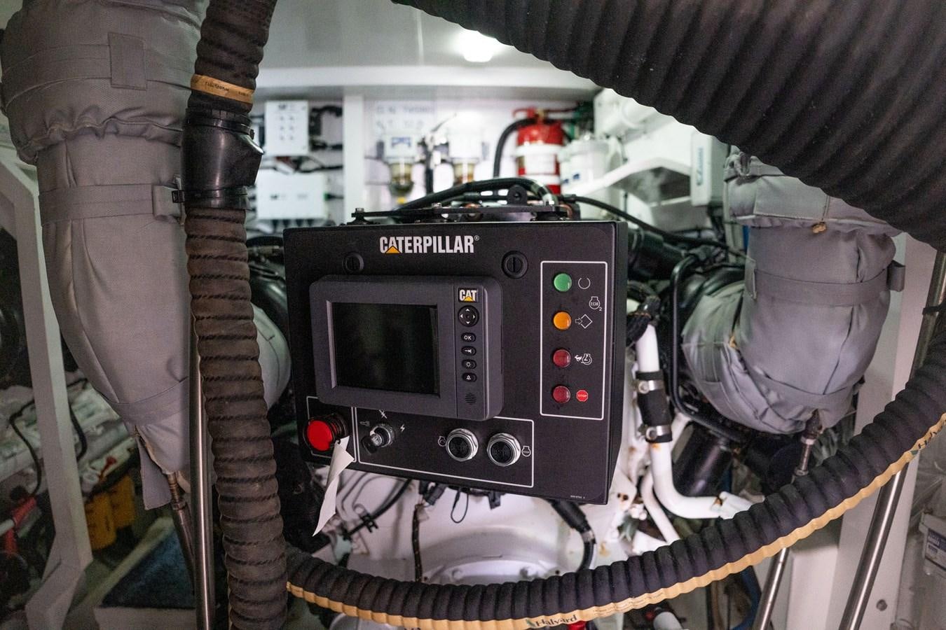a machine in a room aboard PICHOS III Yacht for Sale