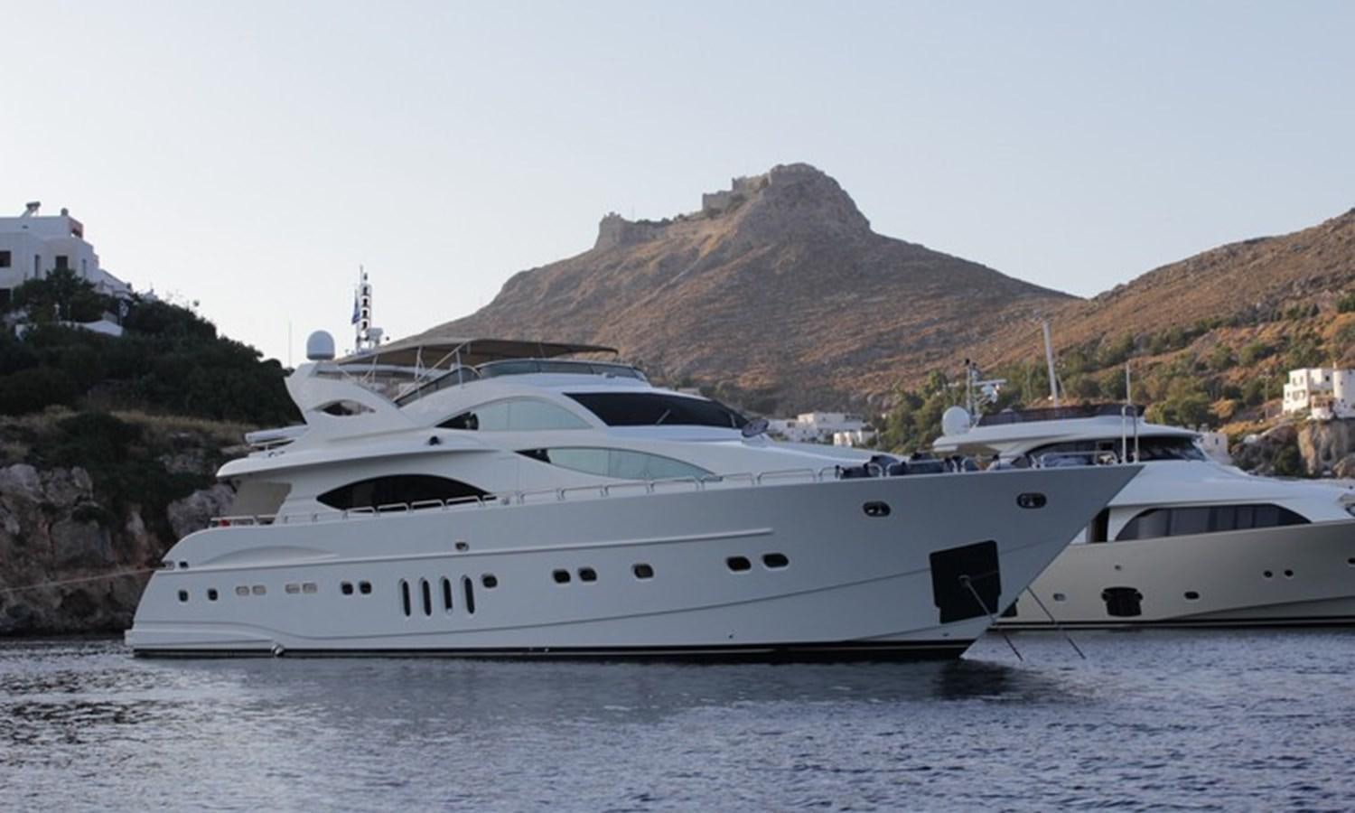 a couple of yachts in the water aboard CORAL Yacht for Sale