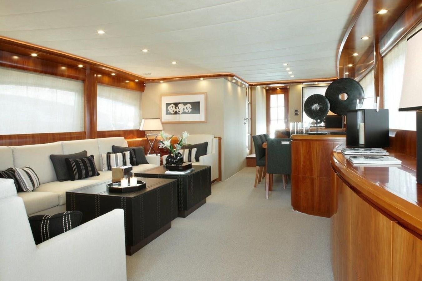 a living room with a large window aboard BARBASILDA Yacht for Sale