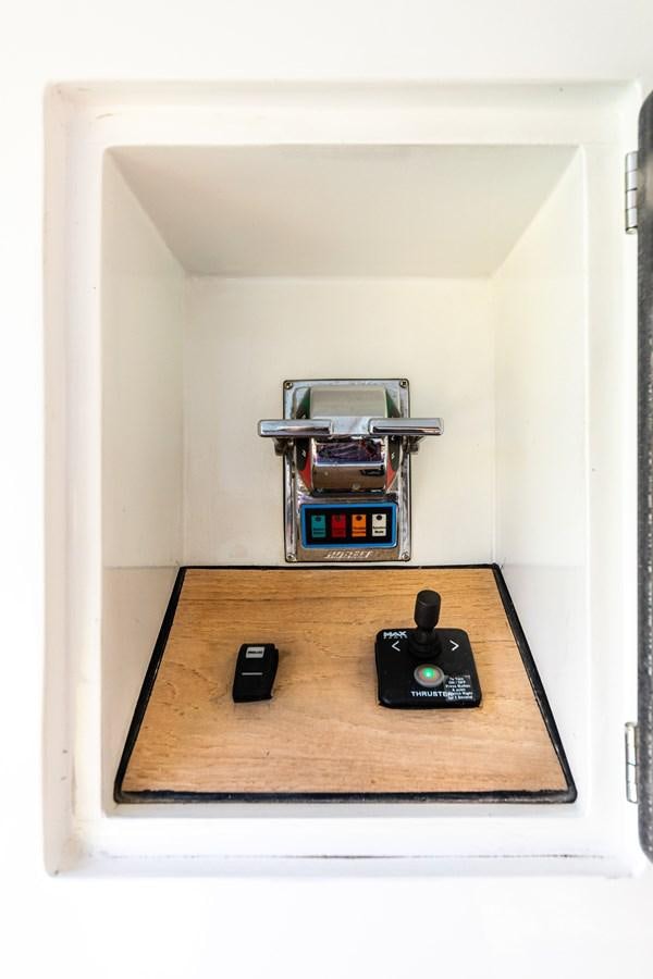 a white box with a black object inside aboard WATER Yacht for Sale