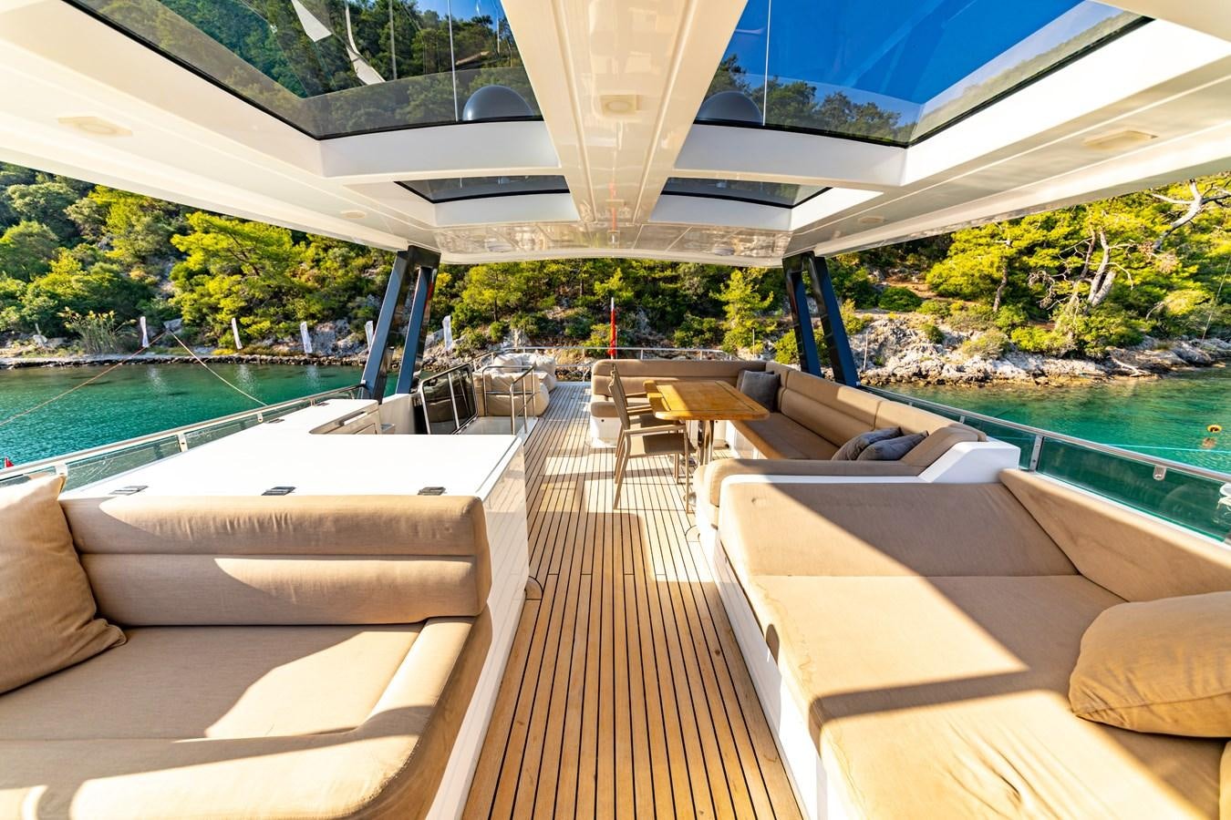 a deck with a pool and a deck aboard WATER Yacht for Sale