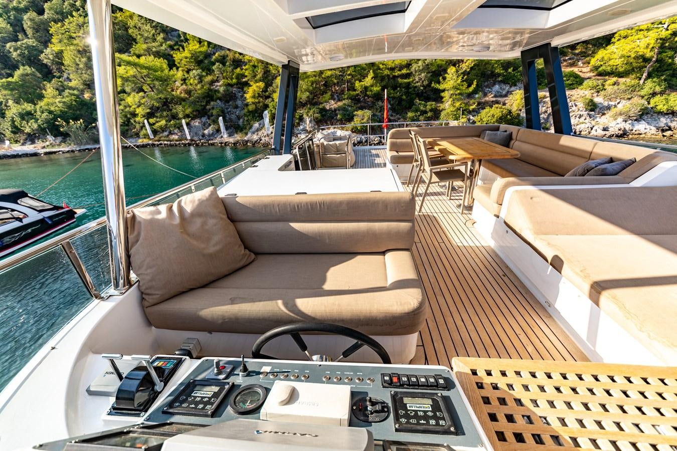 a couch on a deck aboard WATER Yacht for Sale