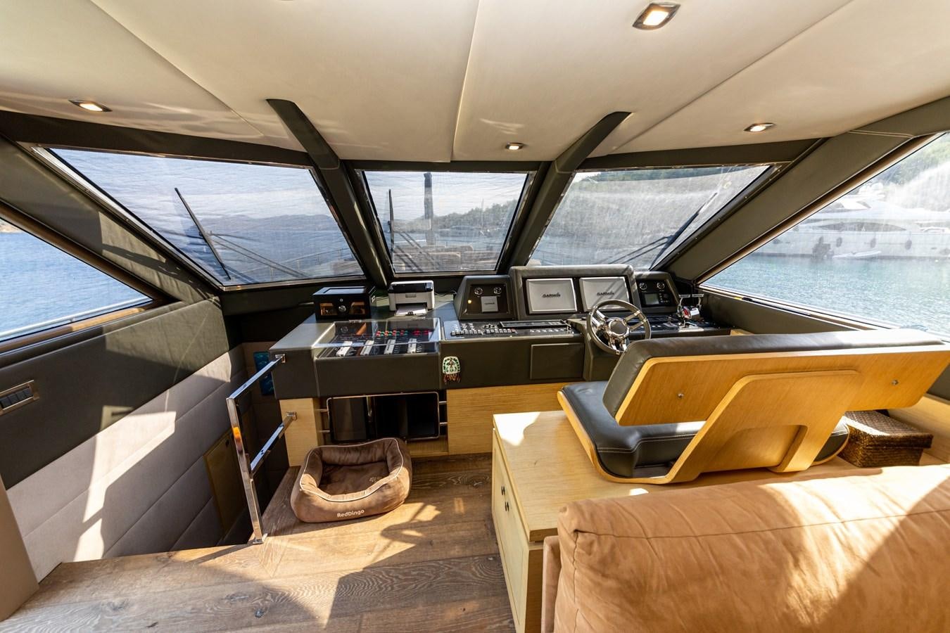 inside of a car aboard WATER Yacht for Sale