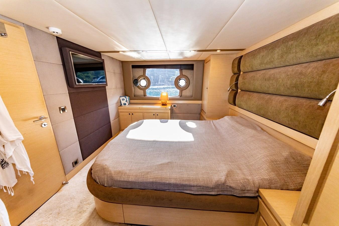 a bed in a room aboard WATER Yacht for Sale