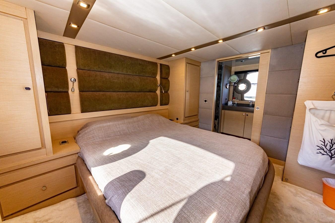 a bed in a room aboard WATER Yacht for Sale