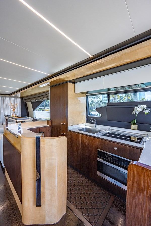 a kitchen with a wood floor aboard STAYSEA Yacht for Sale