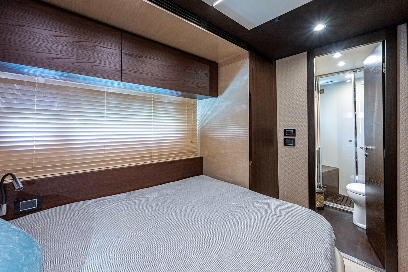 a large bed in a room aboard STAYSEA Yacht for Sale