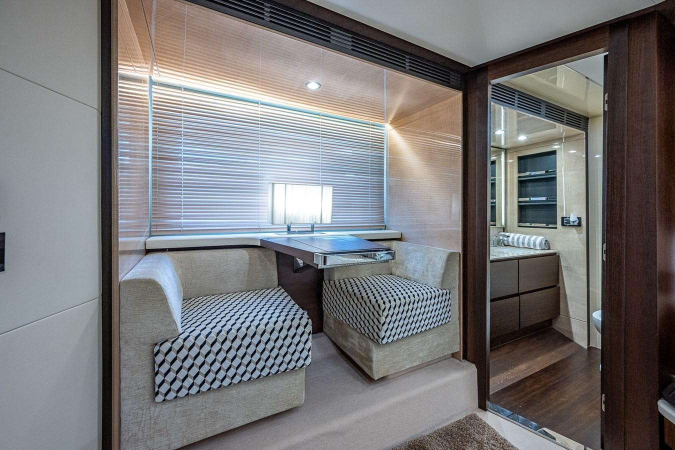 a room with a bed and a table aboard STAYSEA Yacht for Sale