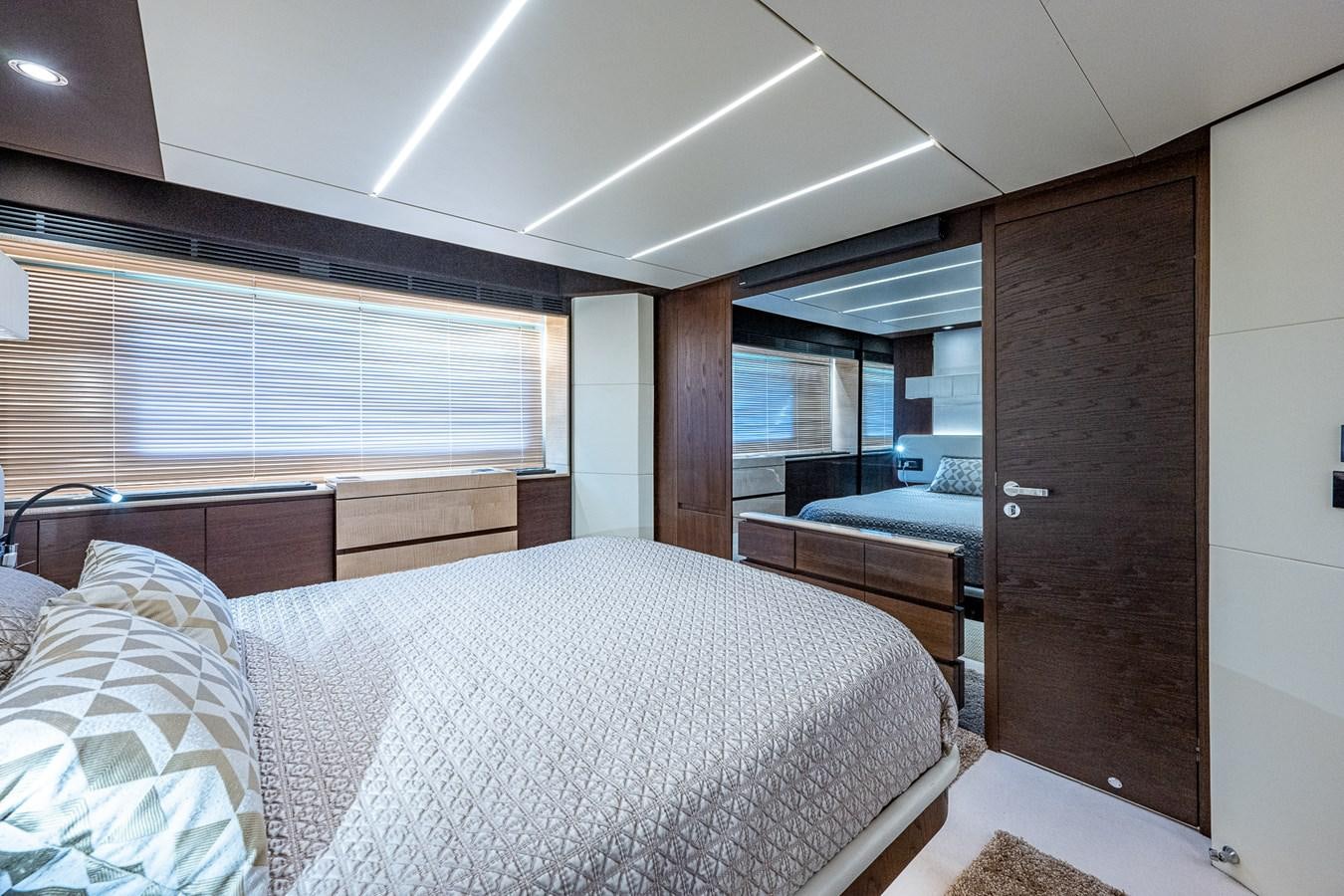 a room with a bed and a window aboard STAYSEA Yacht for Sale