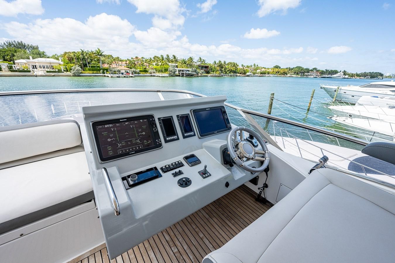 a white car on a boat aboard STAYSEA Yacht for Sale