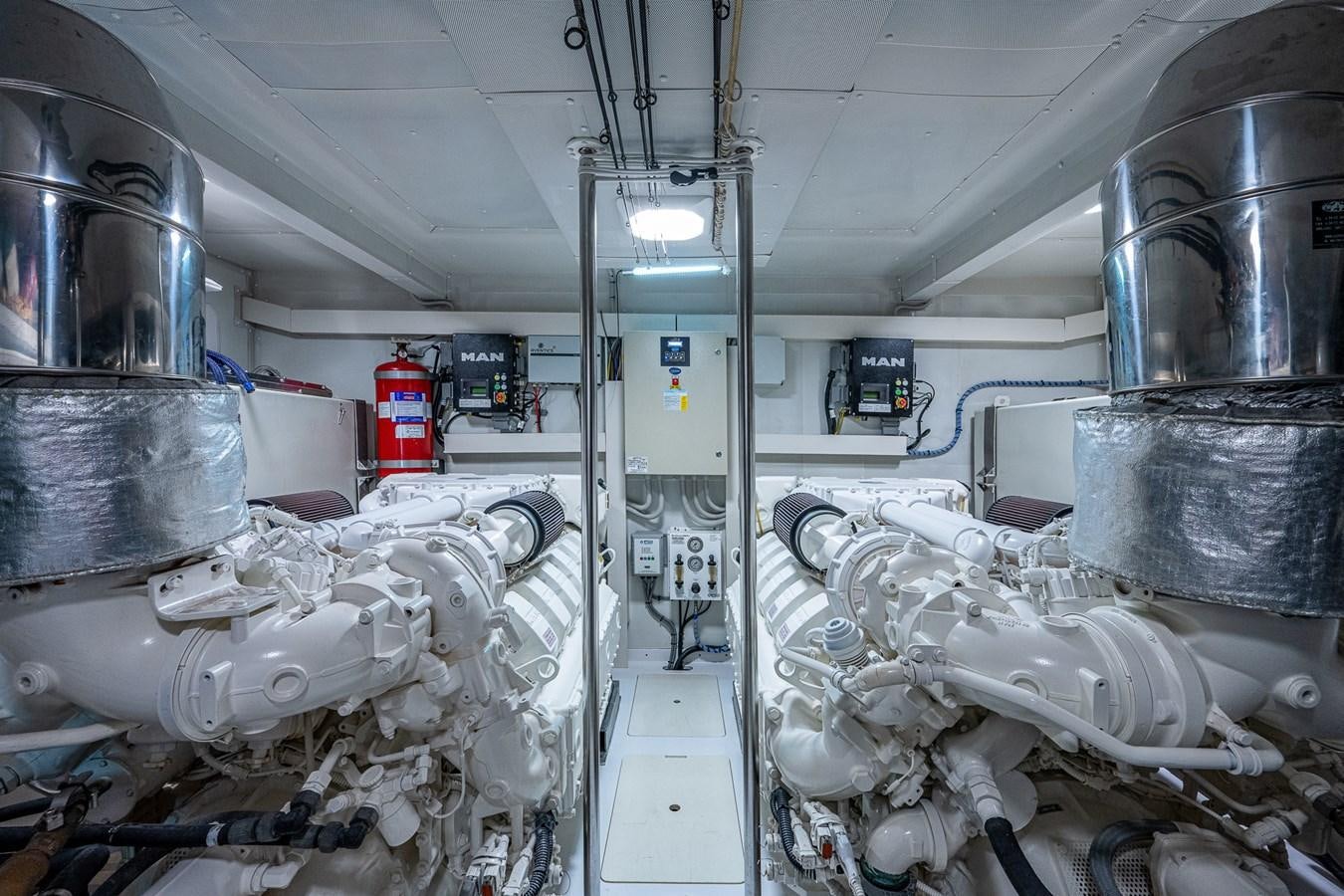 a room with pipes and equipment aboard STAYSEA Yacht for Sale
