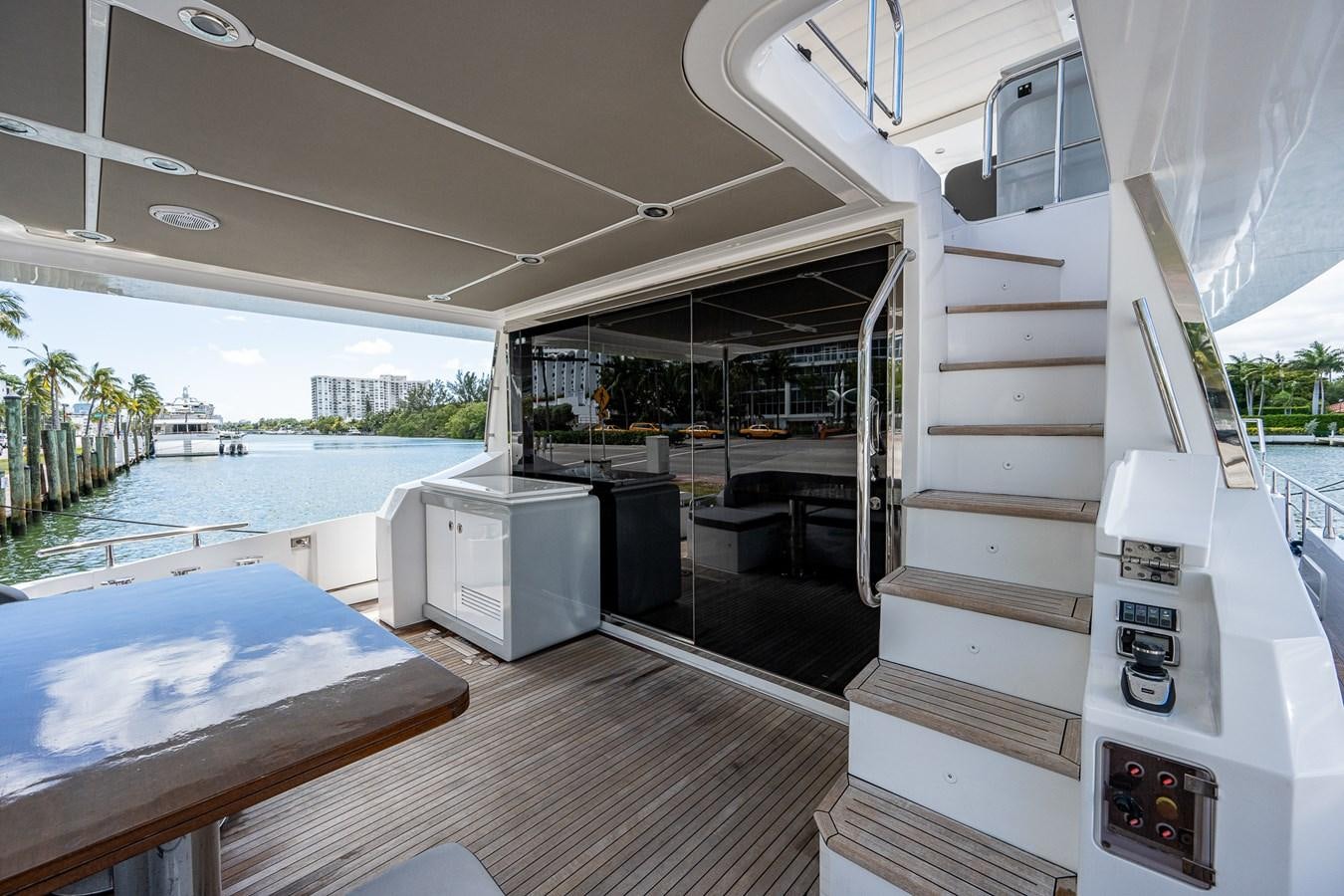 a boat with a deck and a pool aboard STAYSEA Yacht for Sale