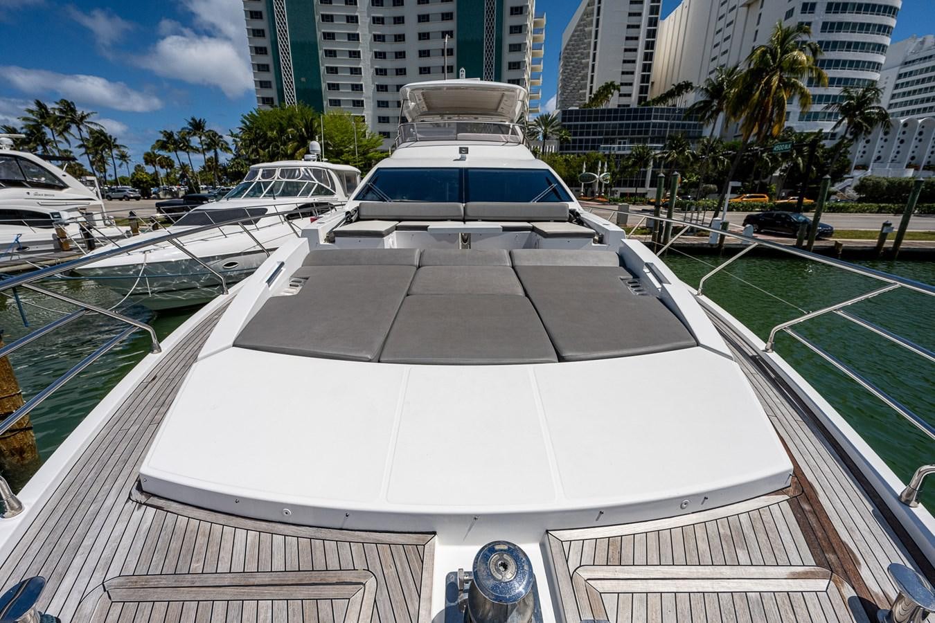 a swimming pool with a building in the background aboard STAYSEA Yacht for Sale
