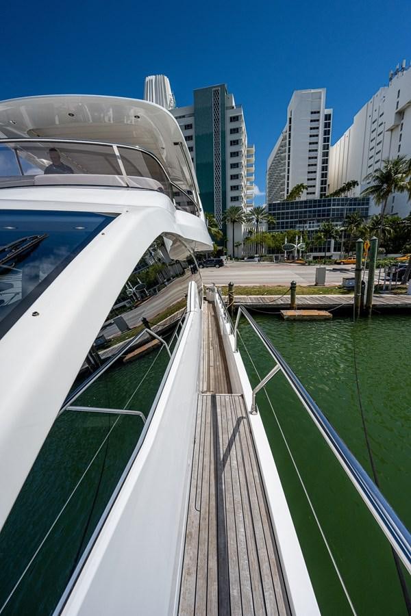 a large white boat on a dock aboard STAYSEA Yacht for Sale