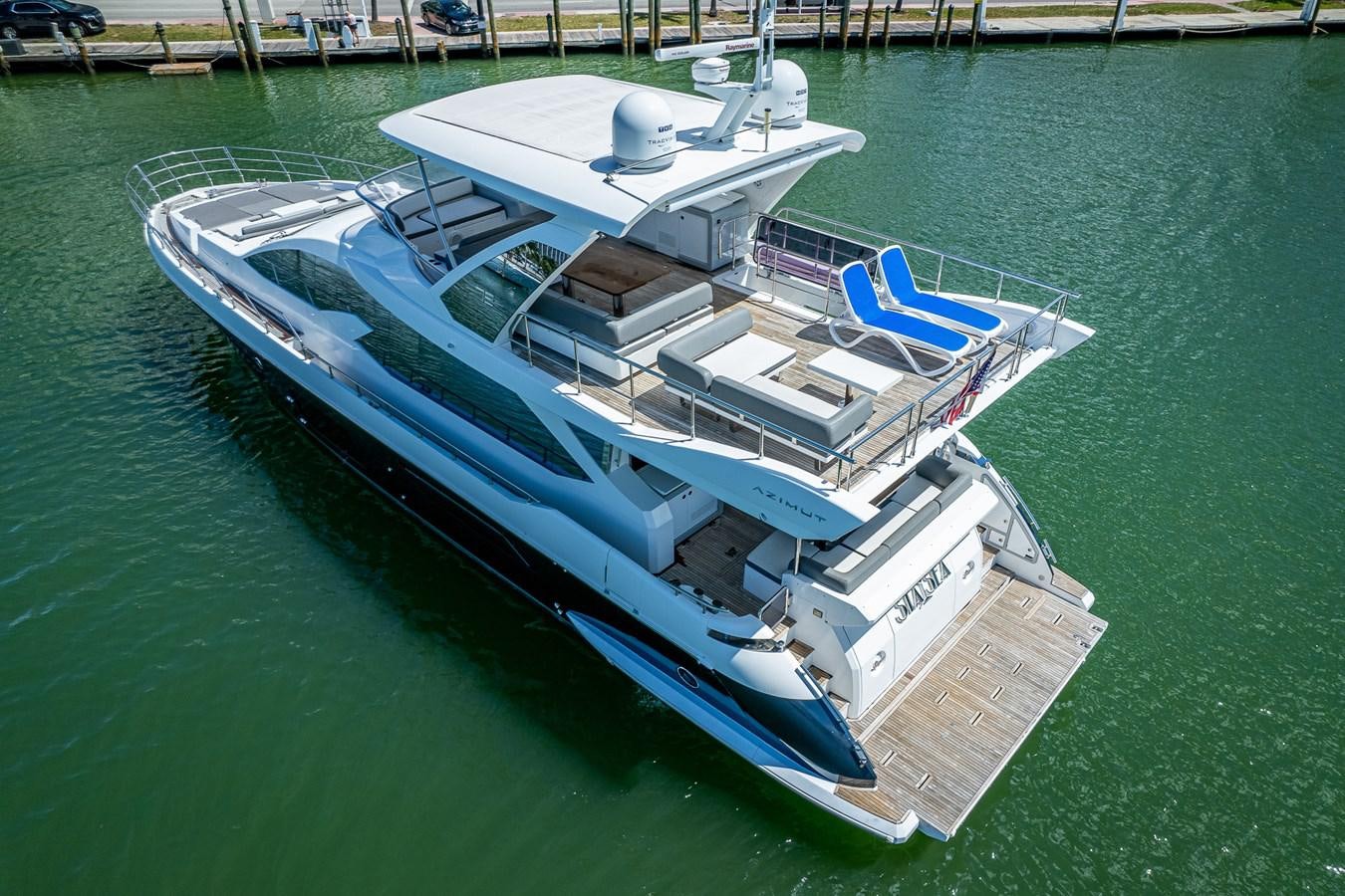 a large boat on the water aboard STAYSEA Yacht for Sale