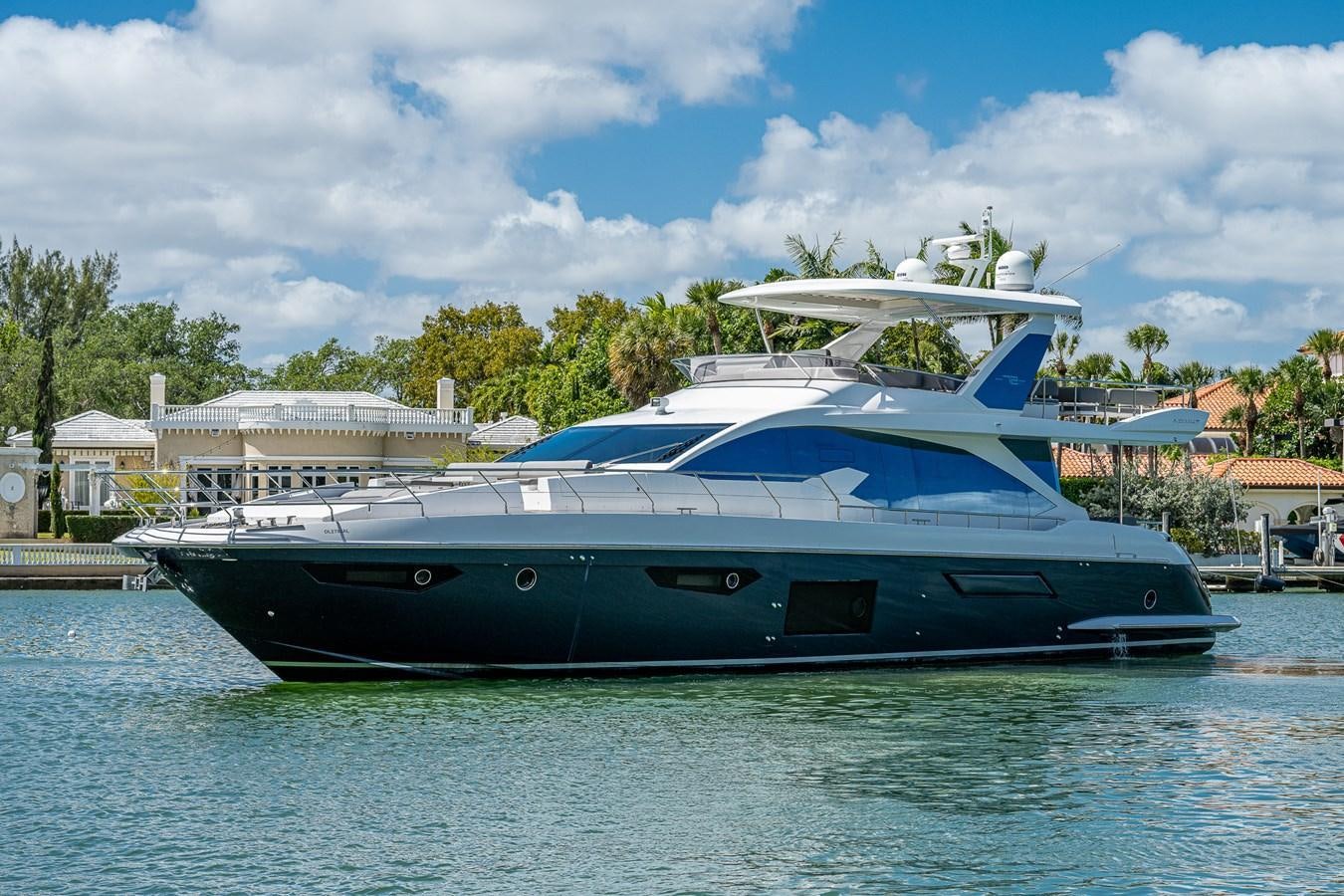 a large boat in a harbor aboard STAYSEA Yacht for Sale