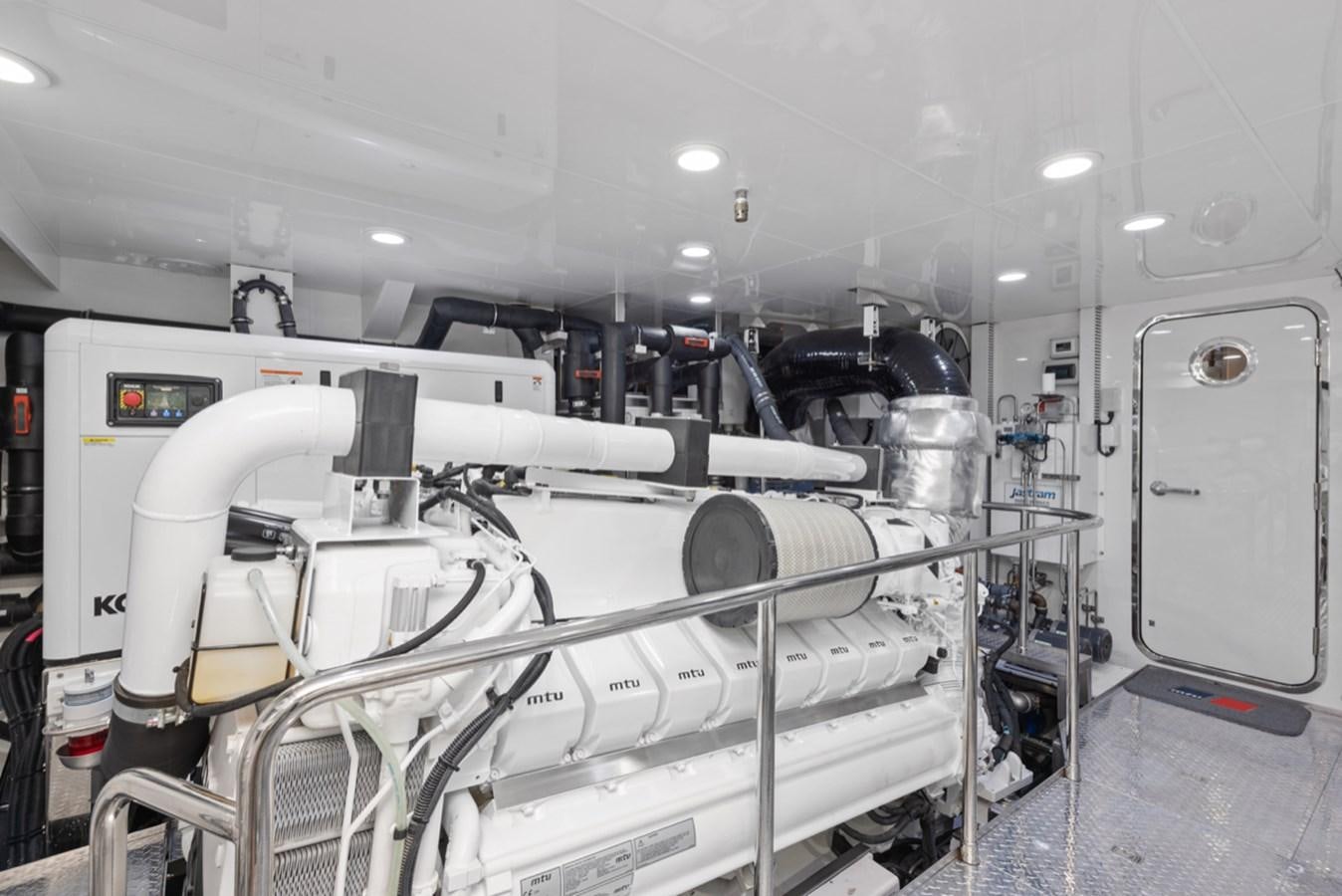 a room with machines and equipment aboard EVERGLADE Yacht for Sale