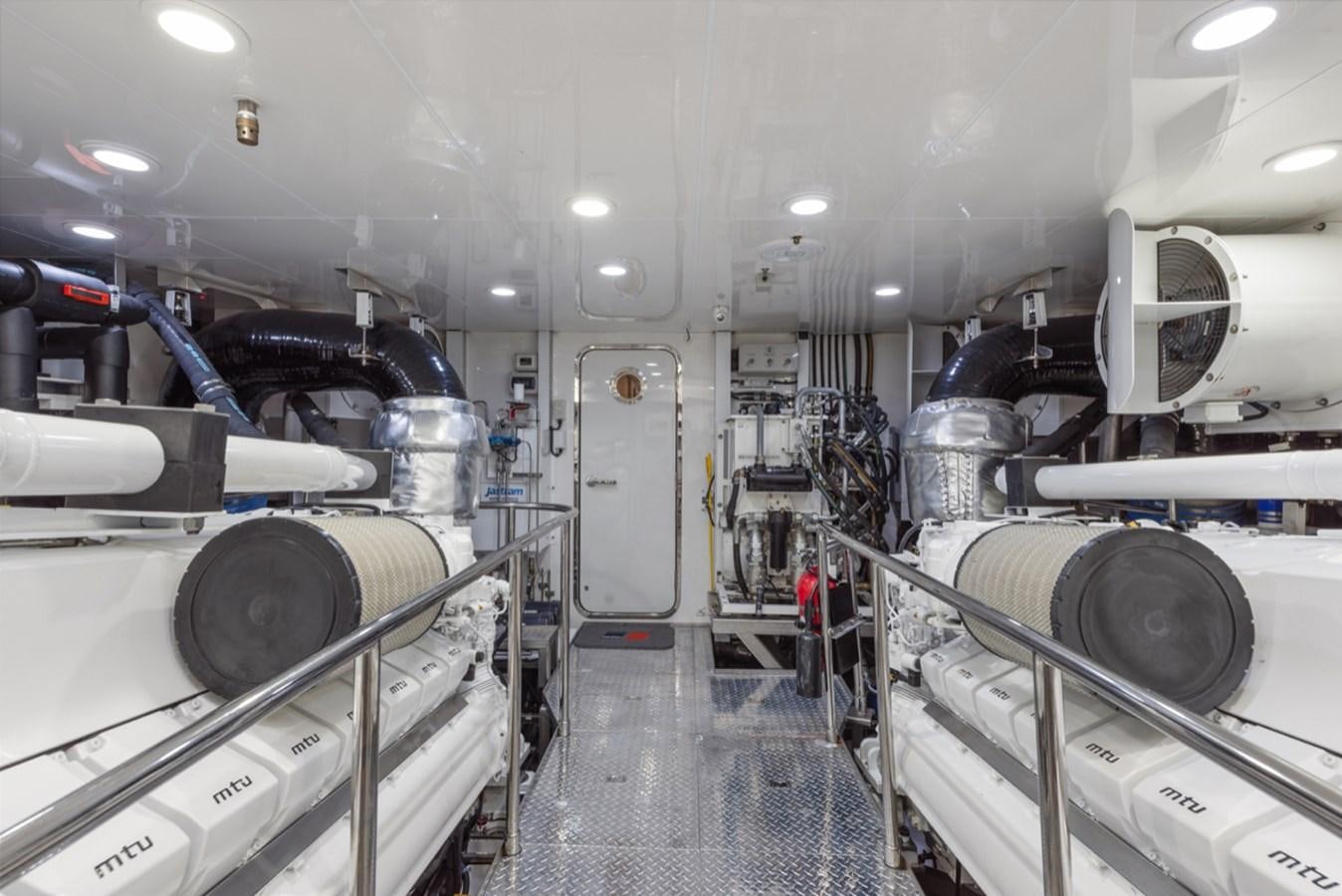 a room with machines aboard EVERGLADE Yacht for Sale