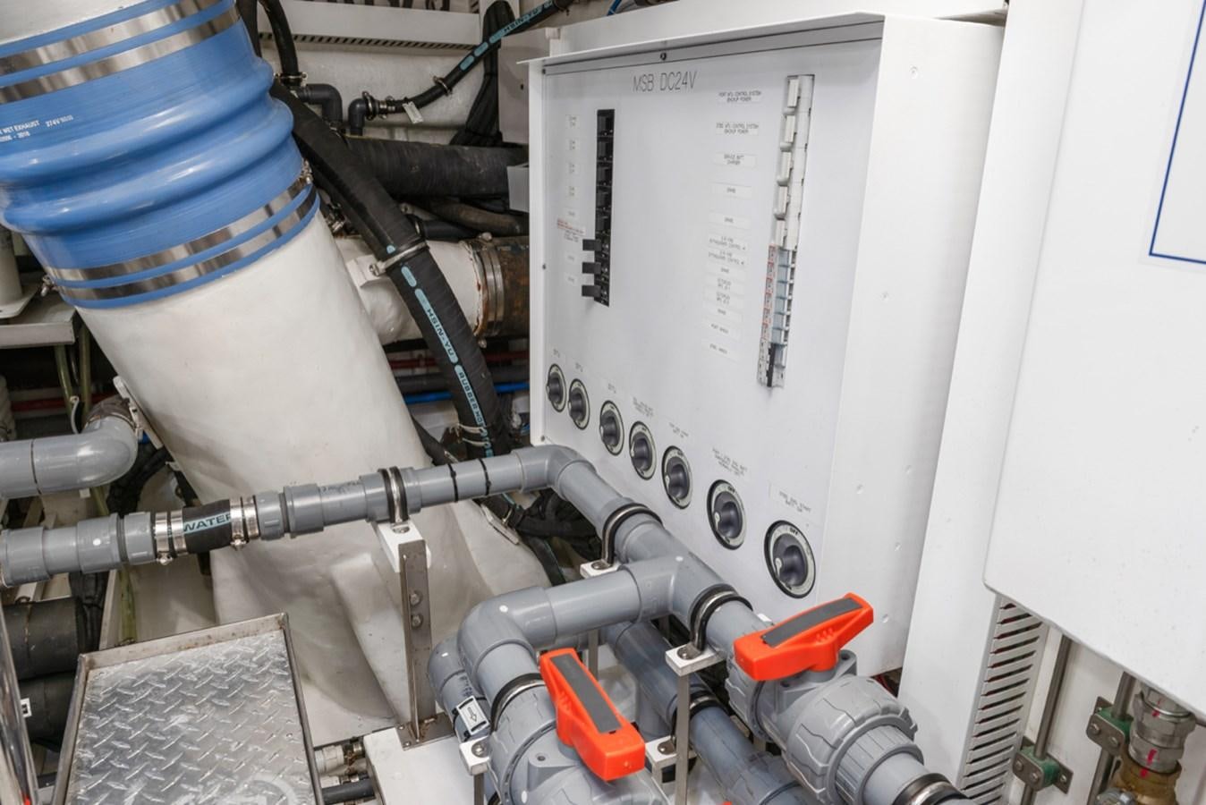 a machine with wires and a white board aboard EVERGLADE Yacht for Sale