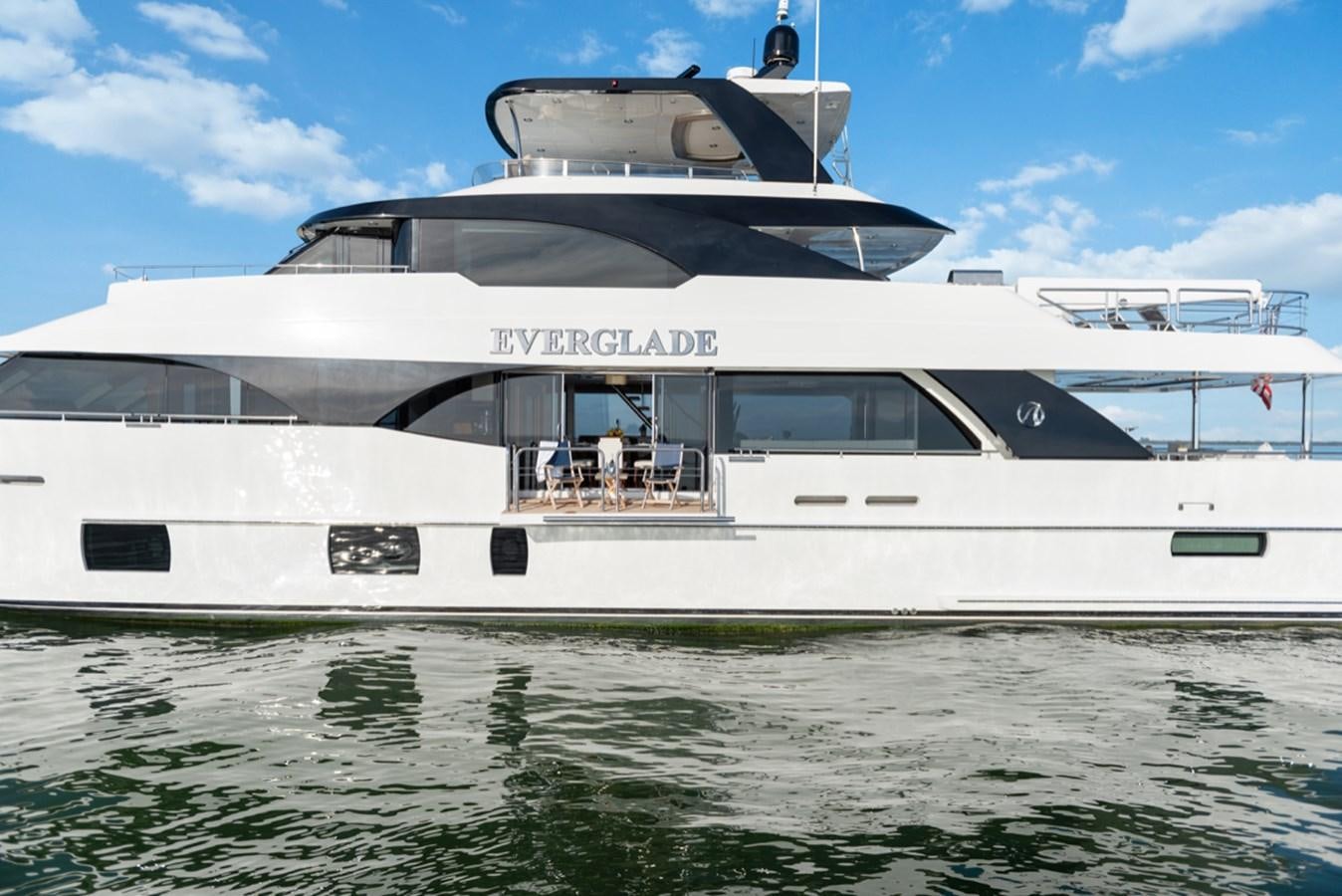 a white yacht on the water aboard EVERGLADE Yacht for Sale
