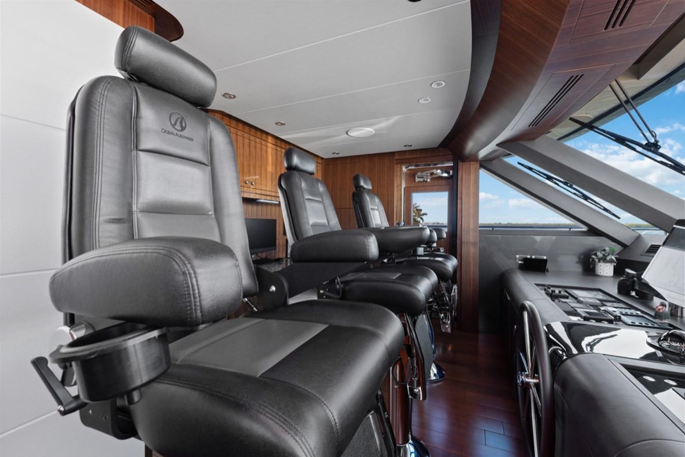 a vehicle with seats and a table aboard EVERGLADE Yacht for Sale