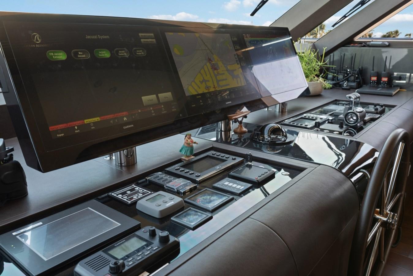 a computer on a table aboard EVERGLADE Yacht for Sale