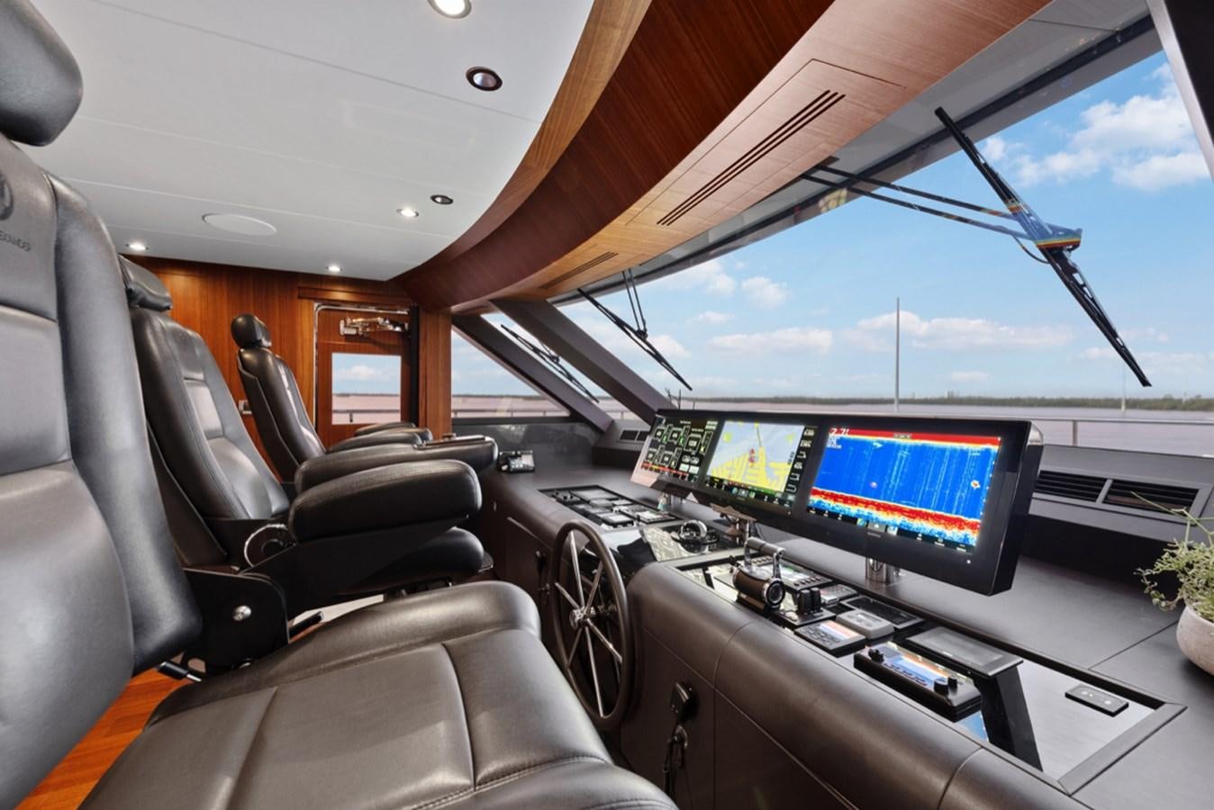 inside of a car with monitors and monitors aboard EVERGLADE Yacht for Sale
