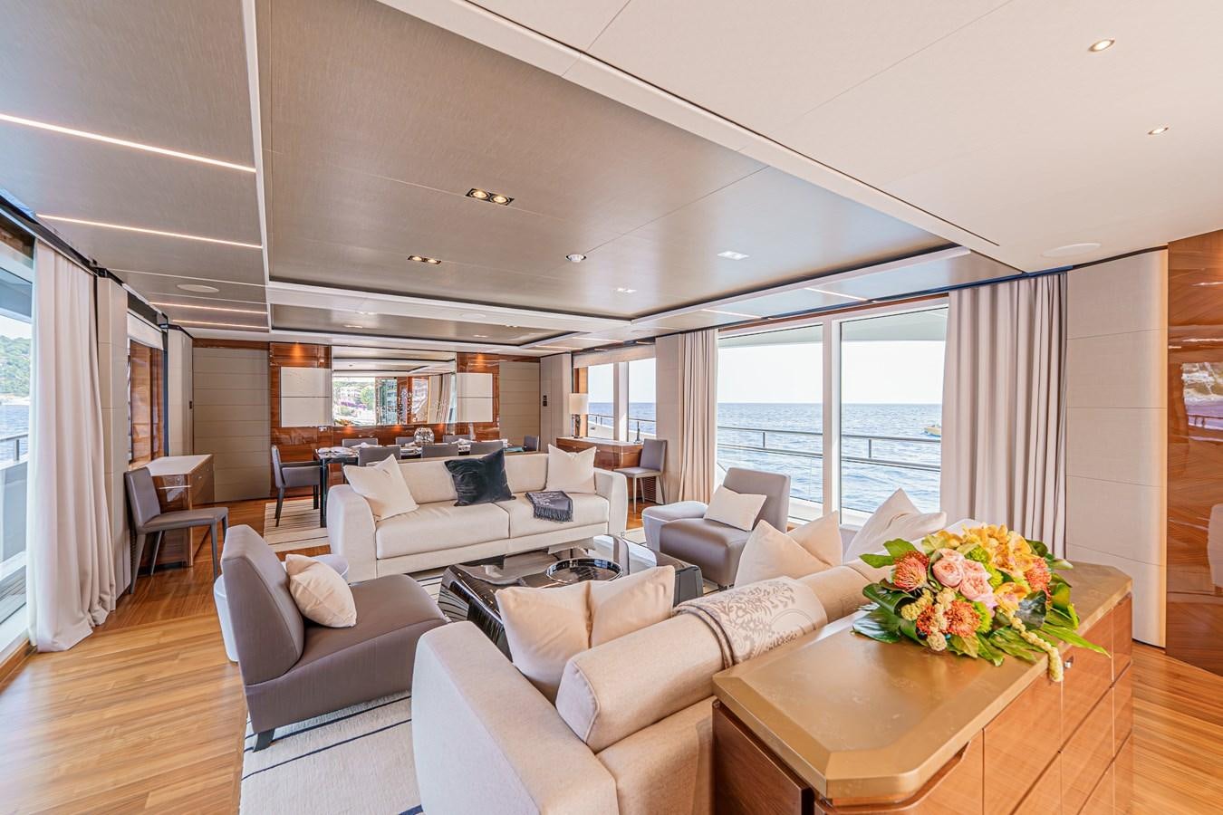 a living room with a large window aboard AVALON Yacht for Sale