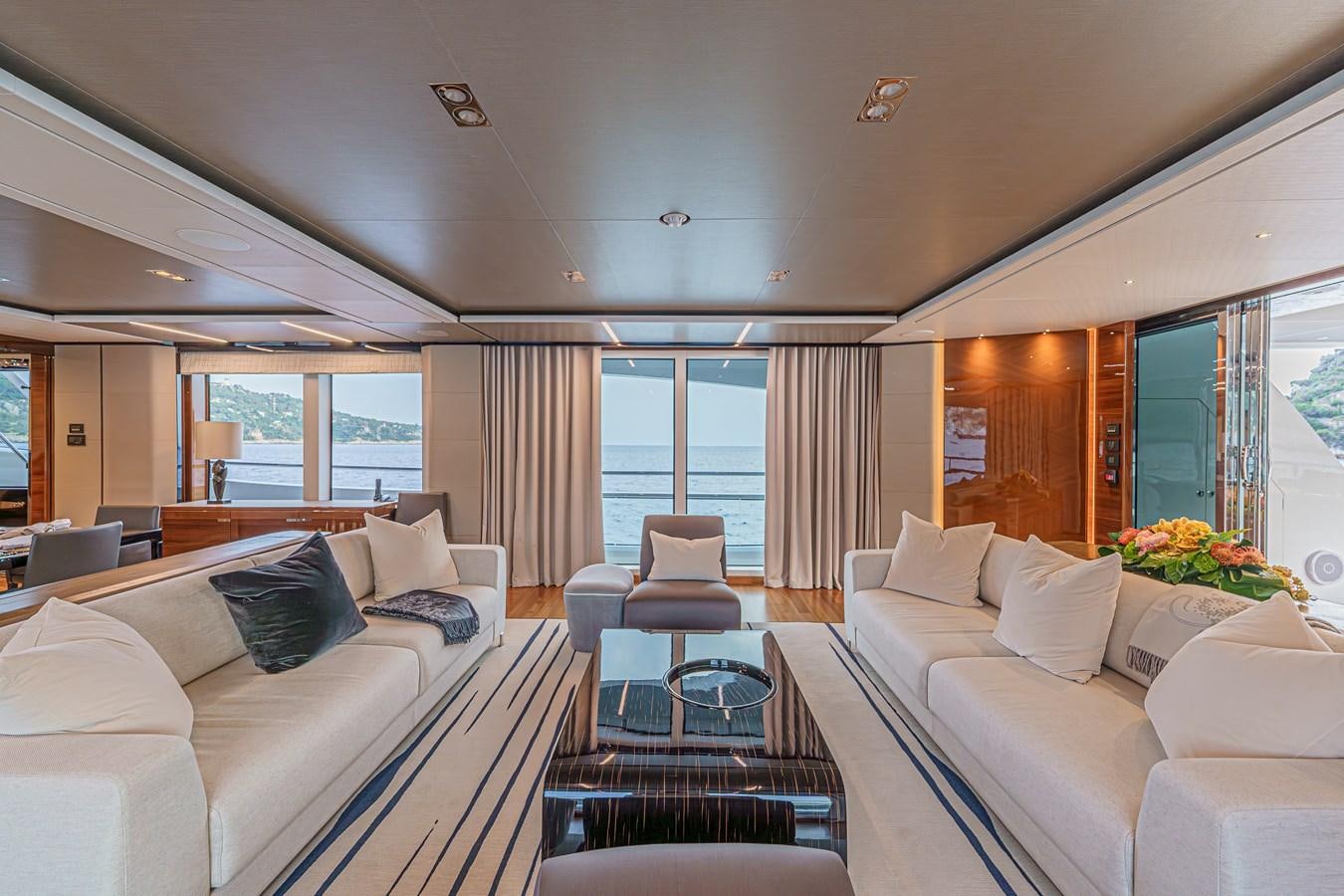 a living room with a large window aboard AVALON Yacht for Sale