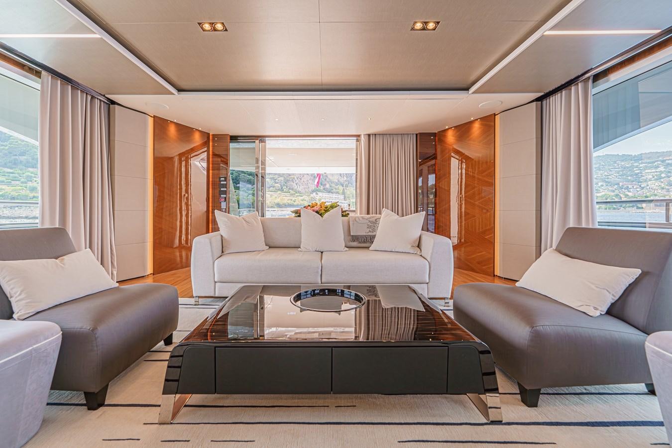 a living room with a large window aboard AVALON Yacht for Sale