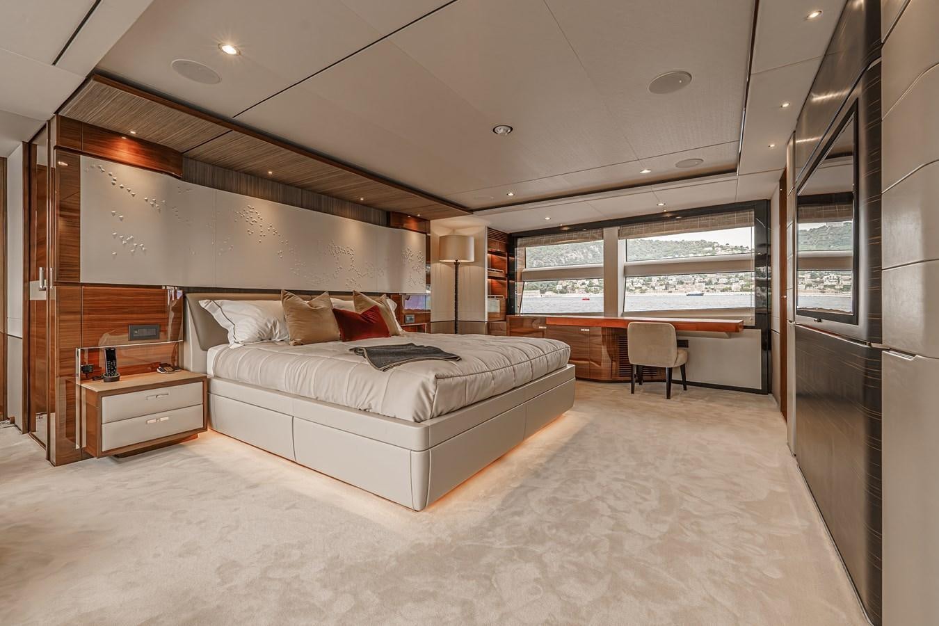 a large bed in a room aboard AVALON Yacht for Sale