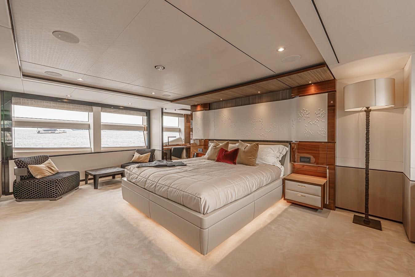 a large bedroom with a large bed aboard AVALON Yacht for Sale