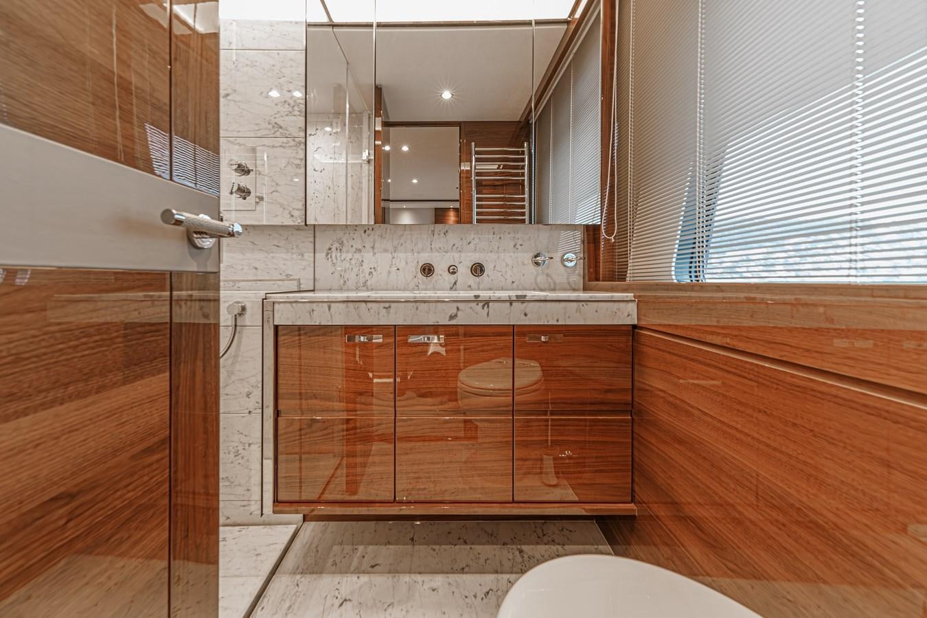 a bathroom with a large mirror aboard AVALON Yacht for Sale