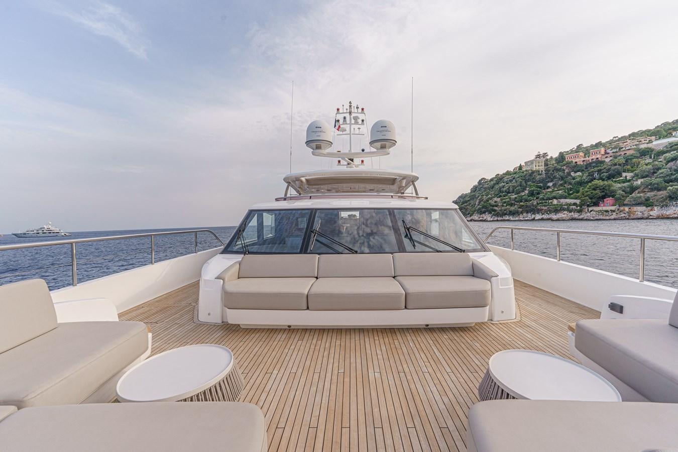 a white car on a deck aboard AVALON Yacht for Sale
