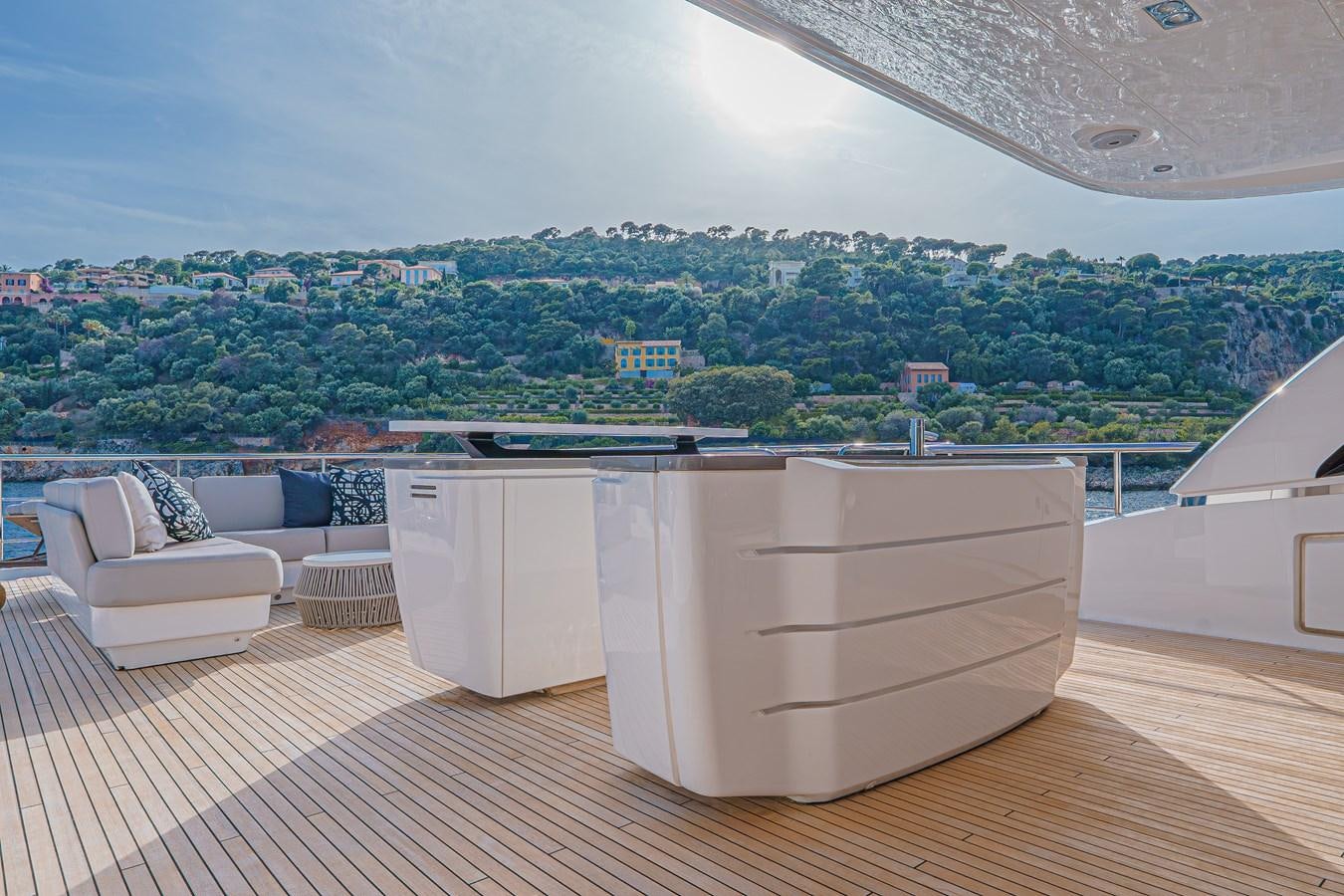 a room with a couch and a pool aboard AVALON Yacht for Sale