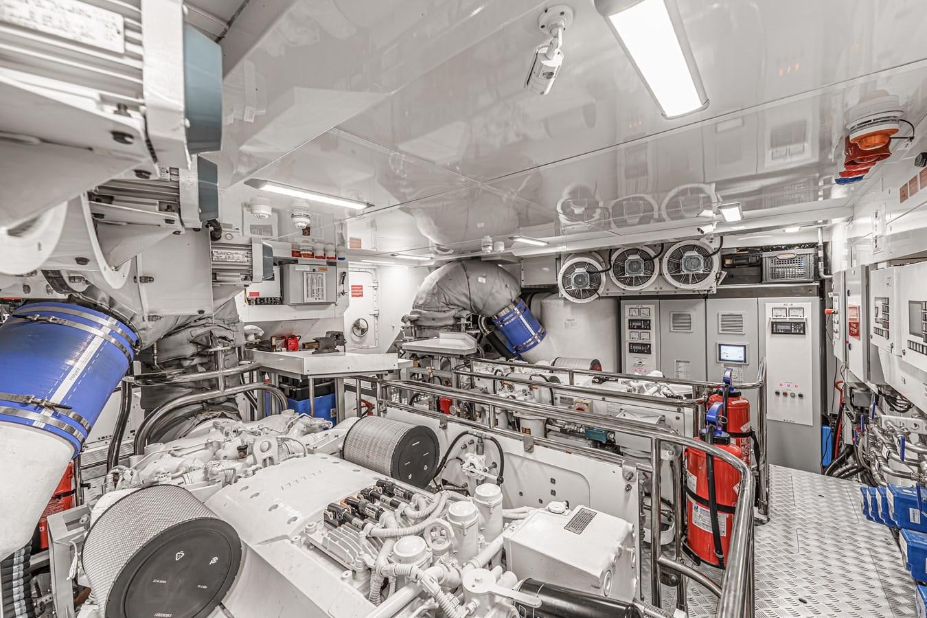 a room with machinery and pipes aboard AVALON Yacht for Sale
