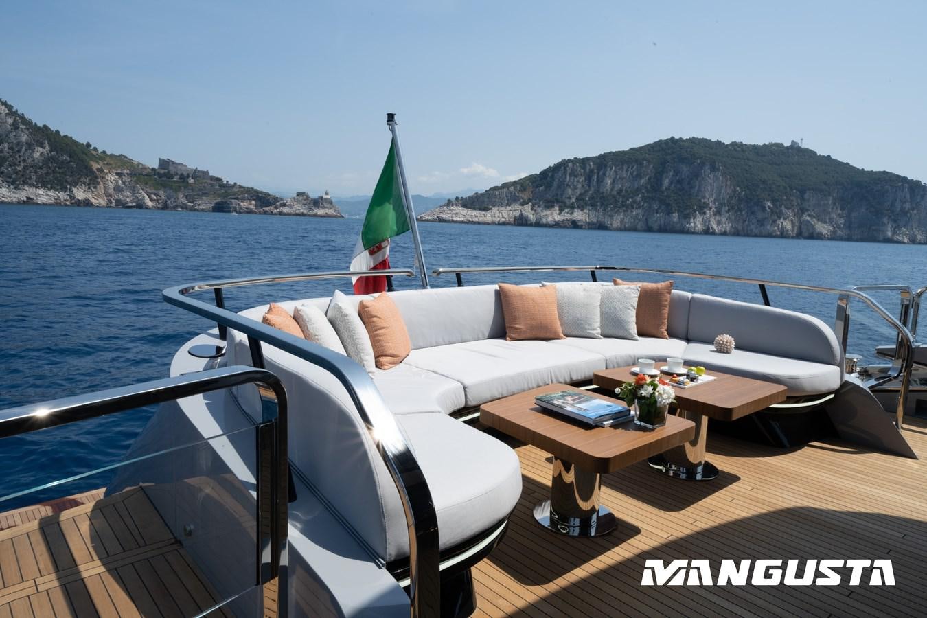 a boat on the water aboard MANGUSTA 104 REV#4 - NEW&DEMO Yacht for Sale