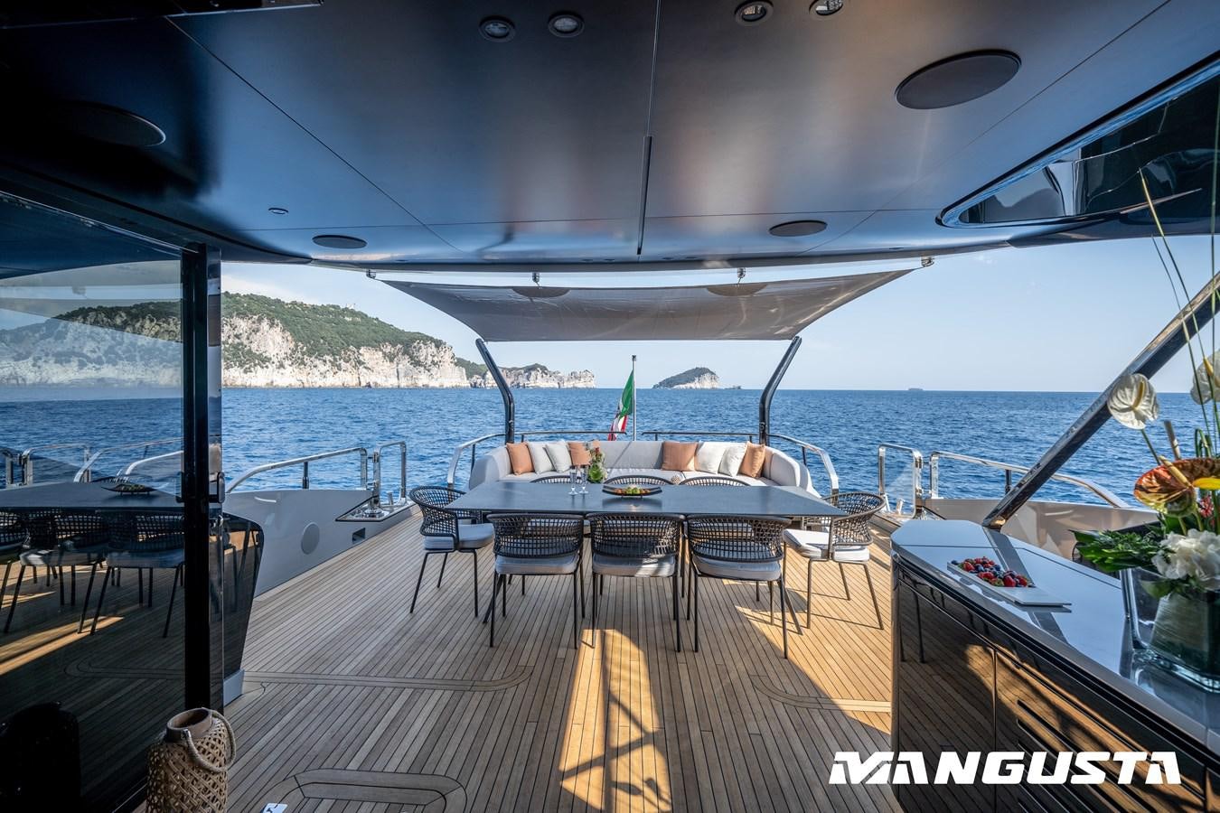 a boat on the water aboard MANGUSTA 104 REV#4 - NEW&DEMO Yacht for Sale