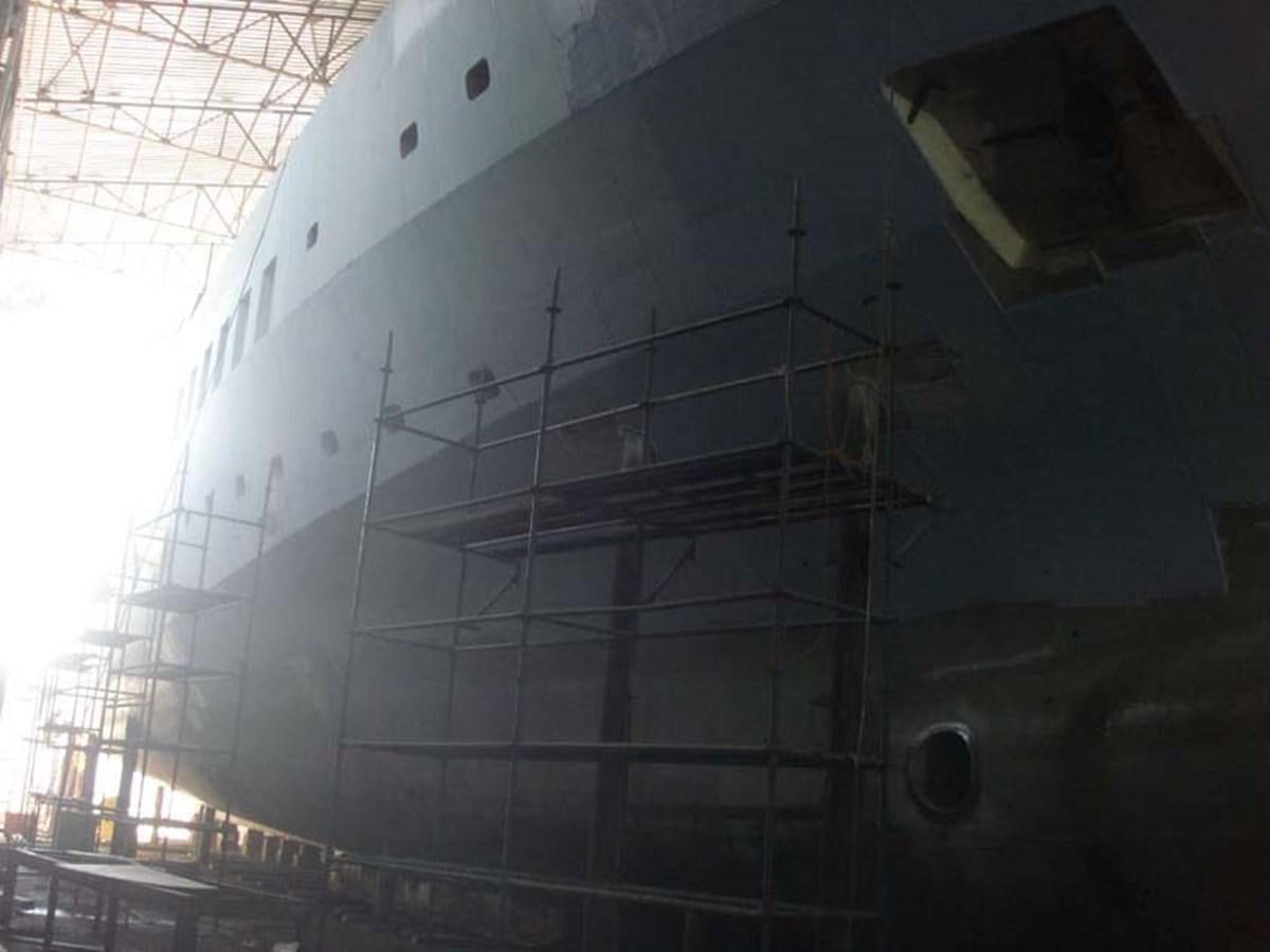 a building with a lot of windows aboard PHEROUSA Yacht for Sale