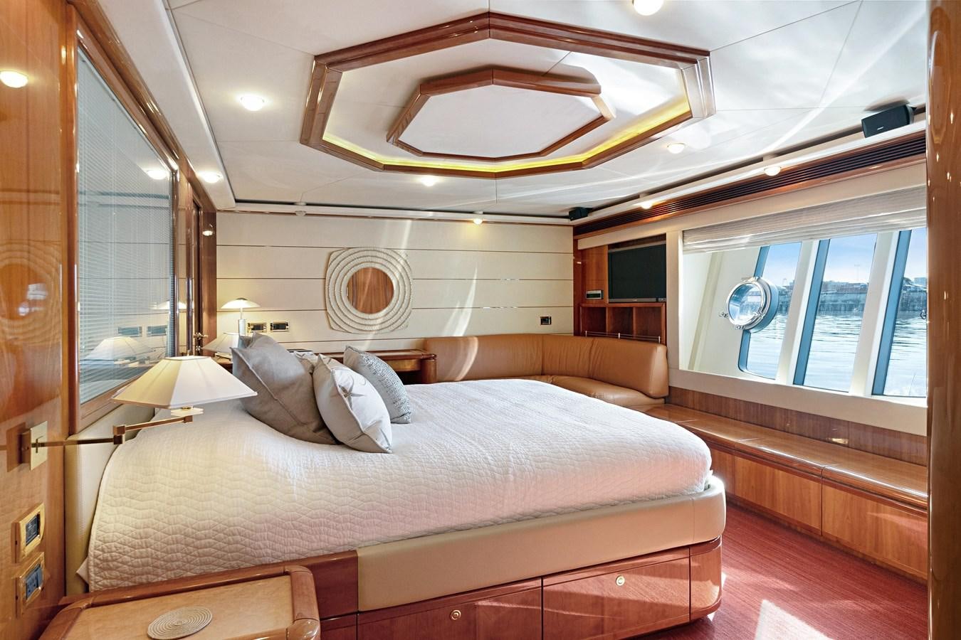 a bed in a room aboard EL PAVICA Yacht for Sale