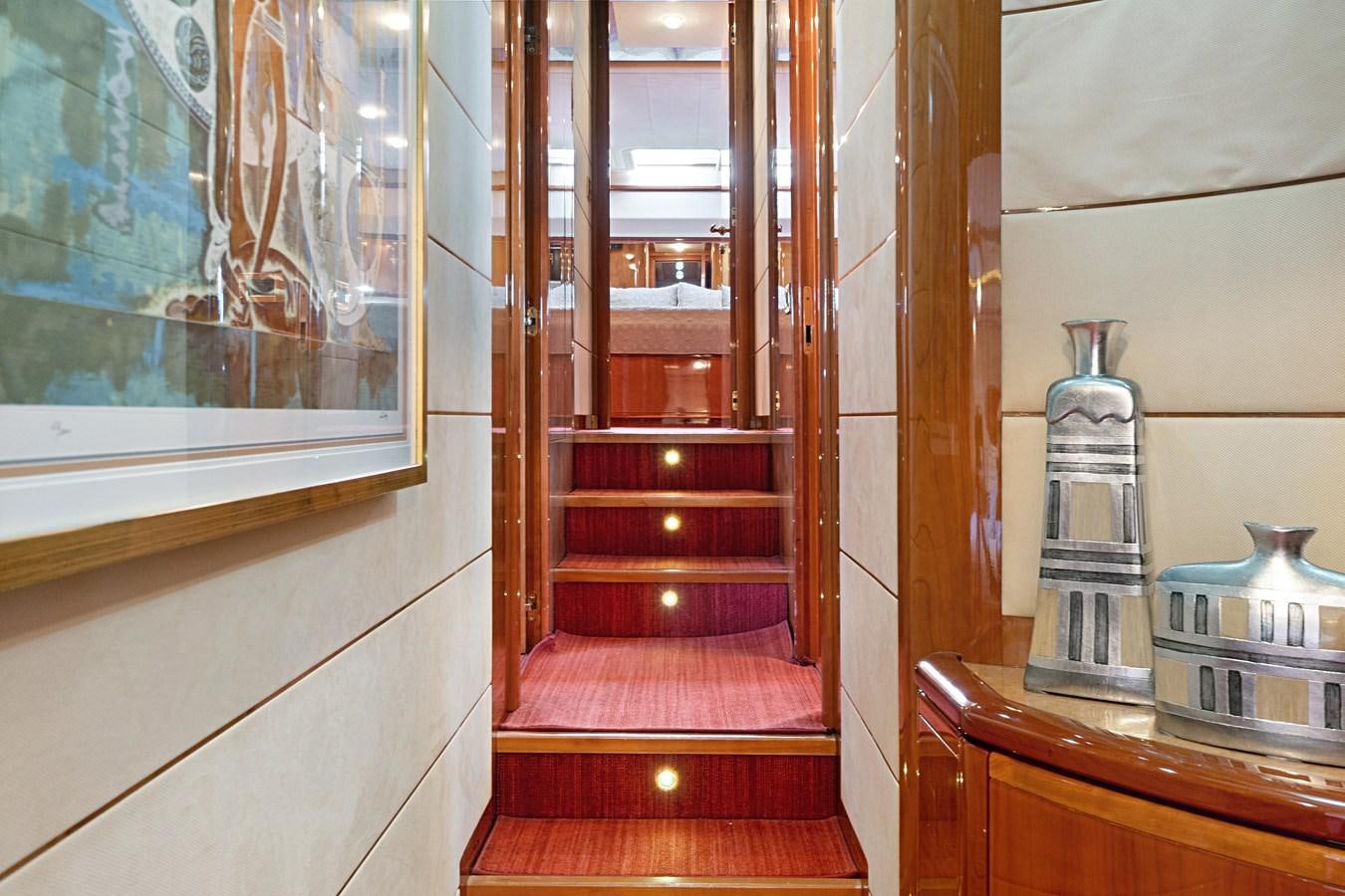 a hallway with a glass door aboard EL PAVICA Yacht for Sale