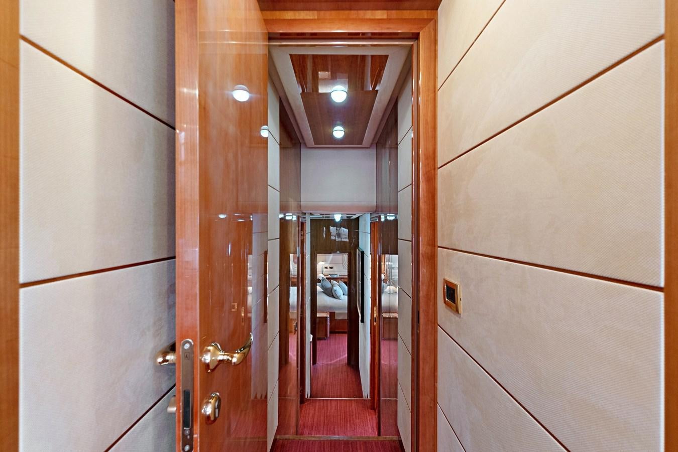 a hallway with doors aboard EL PAVICA Yacht for Sale