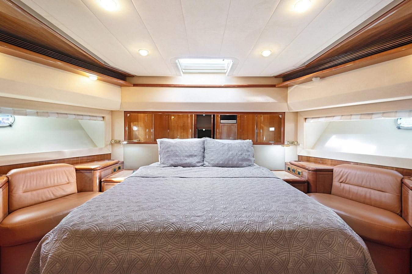 a large bed in a room aboard EL PAVICA Yacht for Sale