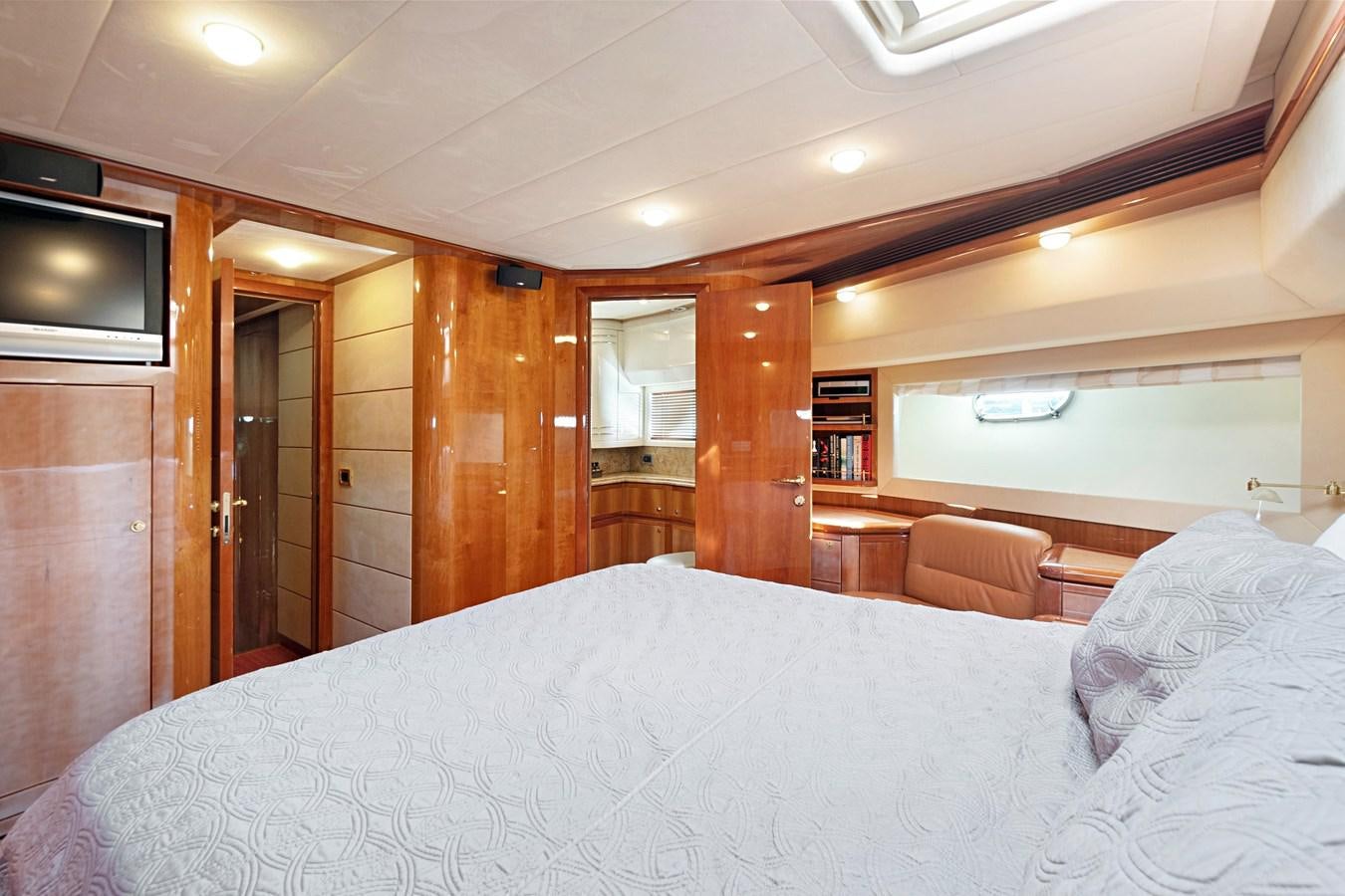 a bed in a room aboard EL PAVICA Yacht for Sale
