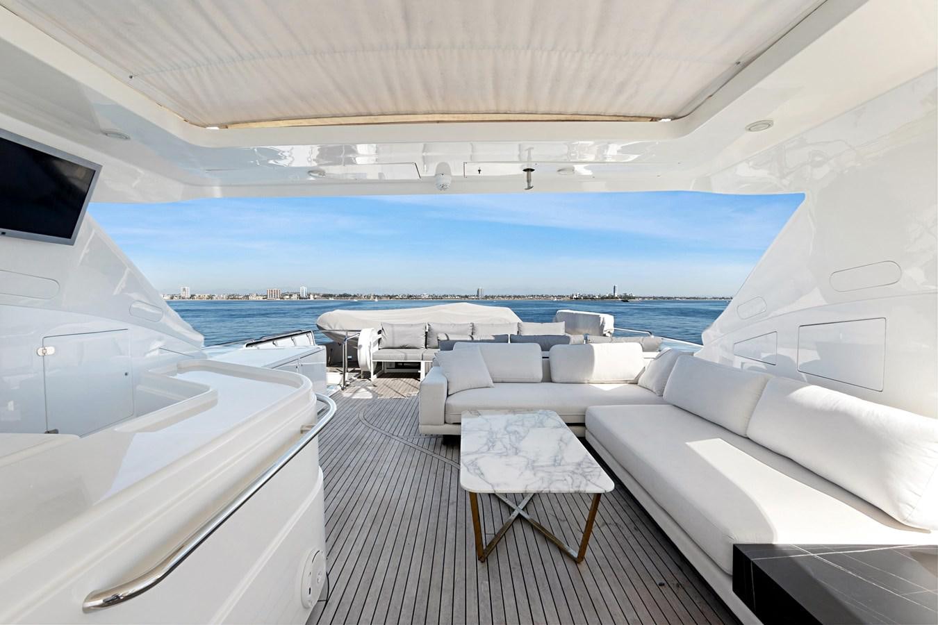 a room with a view of the ocean and the deck aboard EL PAVICA Yacht for Sale