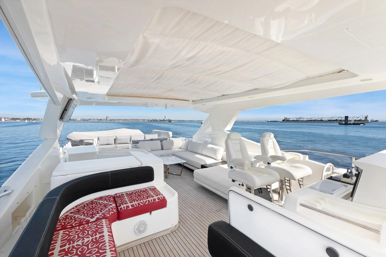 a boat with a red and white stripe on the front aboard EL PAVICA Yacht for Sale