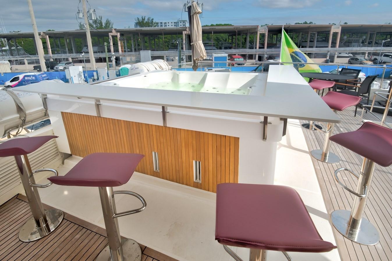 a table with chairs around it aboard LUISAMAY Yacht for Sale