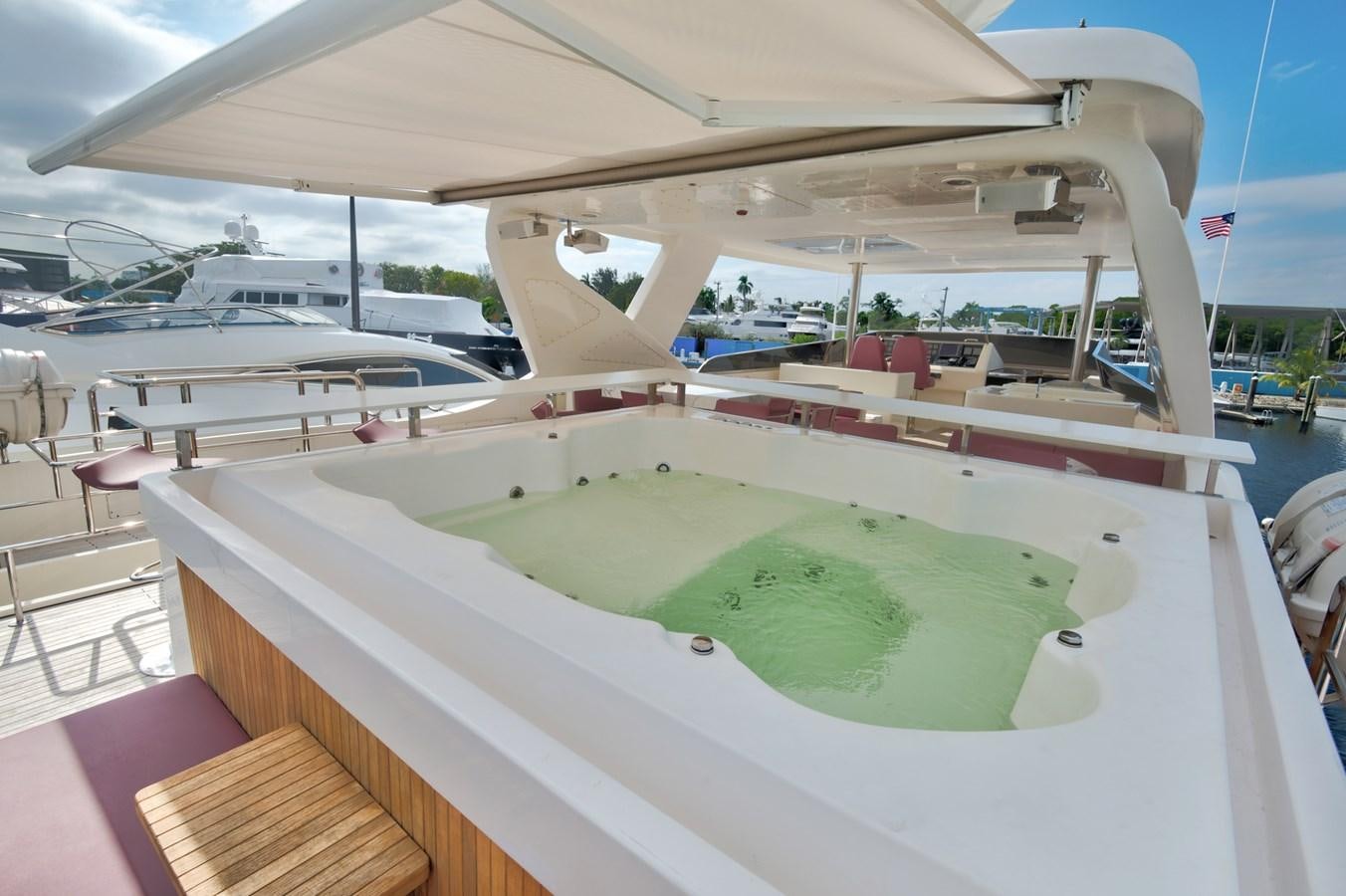 a swimming pool on a deck aboard LUISAMAY Yacht for Sale