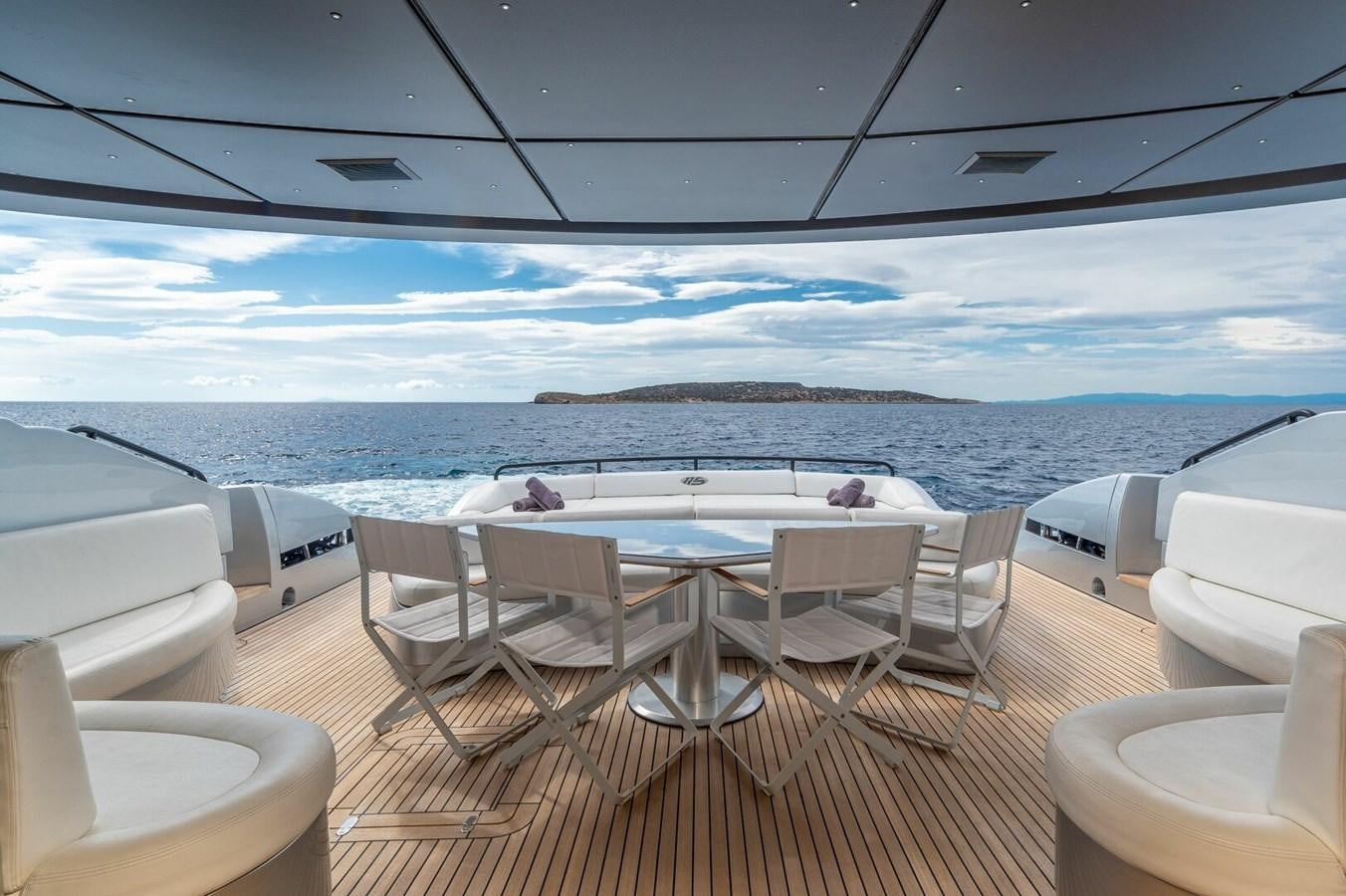 a large room with a large window overlooking a large body of water aboard REBOOT Yacht for Sale