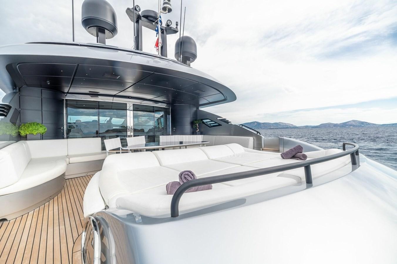a boat on a deck aboard REBOOT Yacht for Sale